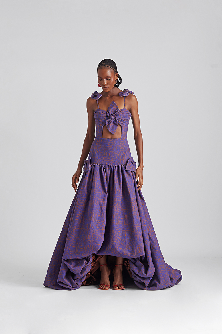 Maxi dress with puff skirt and bow by Lisa Folawiyo